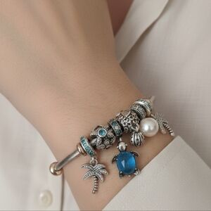 Pandora Autentic Silver And Rose Gold Plated Bangle Bracelet With Charms